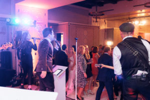 A 20-piece live wedding band from Ben Mallare Events & Entertainment performing on stage, with musicians and singers engaging the wedding guests on the dance floor.