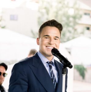 Lead vocalist performing at a wedding event, representing Ben Mallare Events & Entertainment, specializing in live wedding bands.
