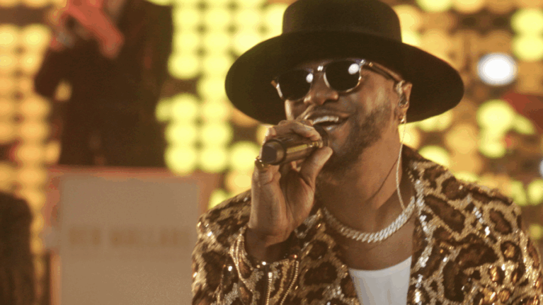 A vocalist from Ben Mallare Events & Entertainment performing on stage, highlighting the vibrant energy of live wedding bands.